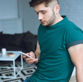 Man looking at smartphone