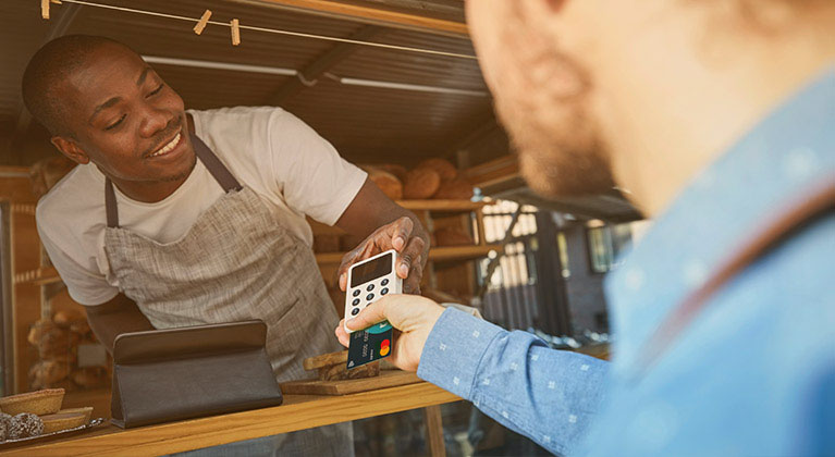 Man making chip and pin payment