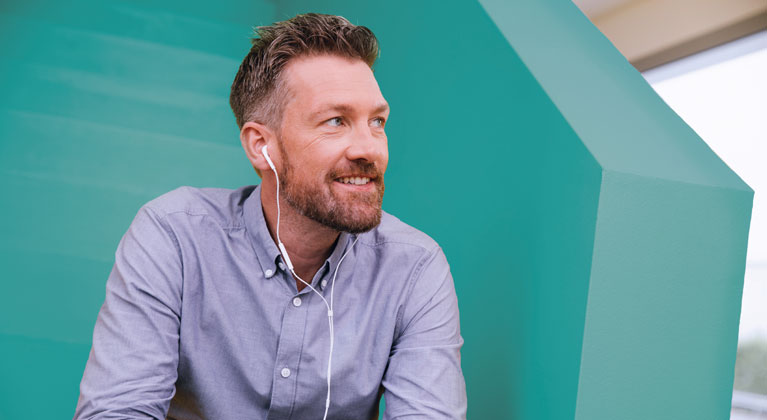 Man wearing headphones.