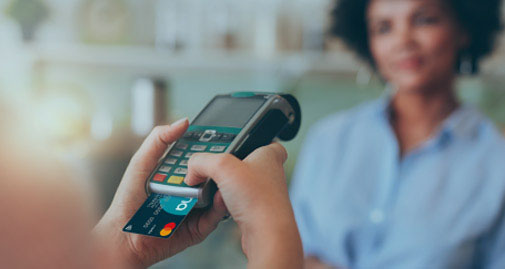 Person making a chip and pin payment with MBNA credit card