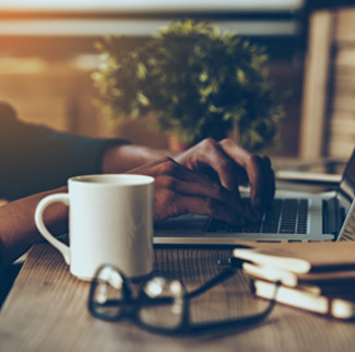 Person using laptop on a table