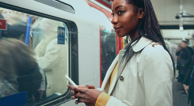 Woman waiting for the train on the London underground