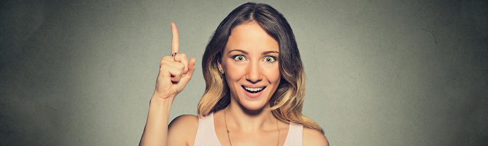 Woman pointing upwards