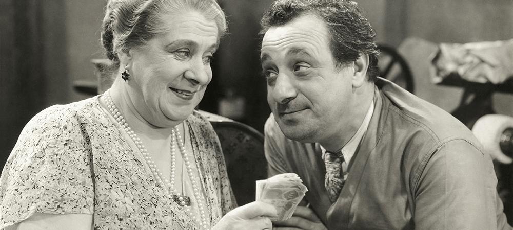 1940's couple holding money