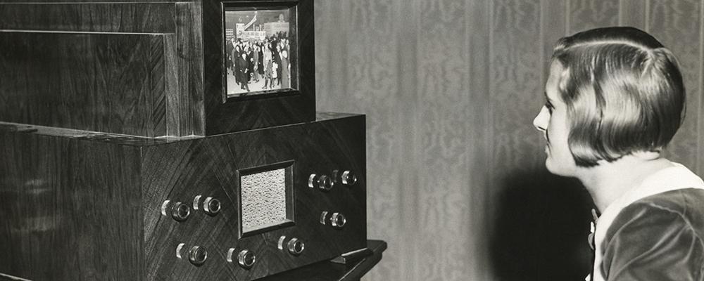 1940's woman watching old TV