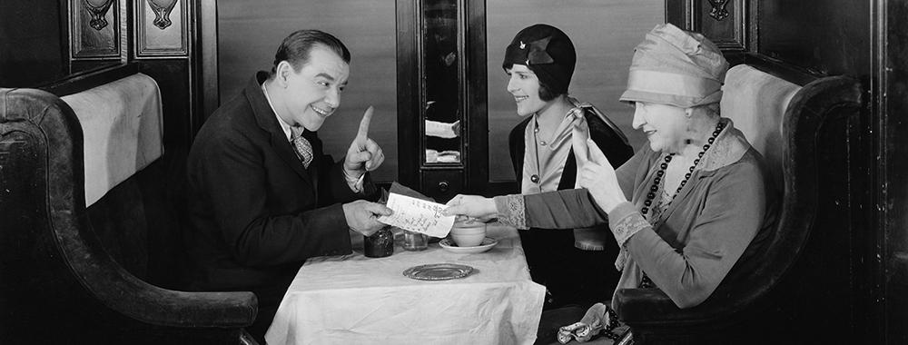 People in restaurant paying bill