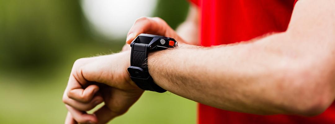 Man looking at a smartwatch