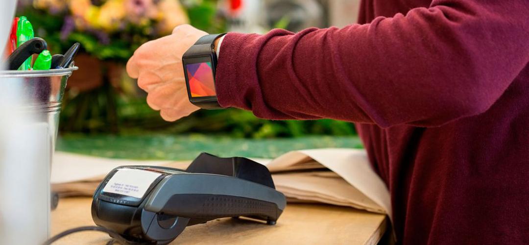Man paying for something with a smartwatch