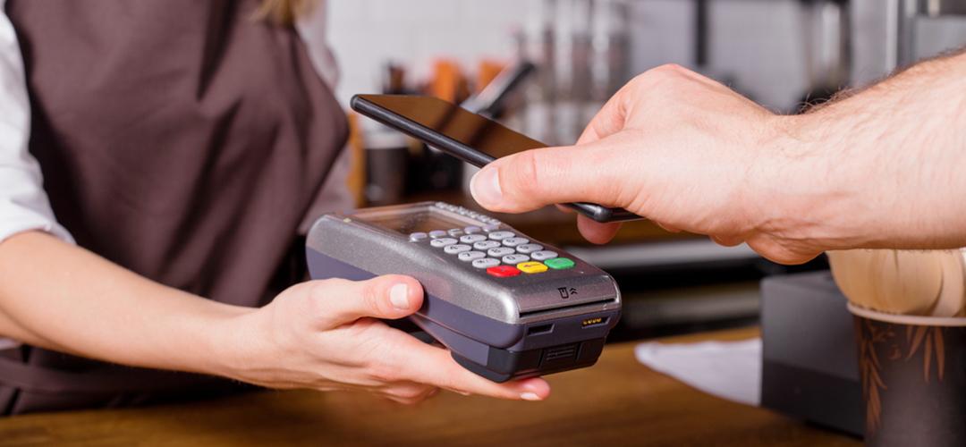 Man paying for something with a smartphone