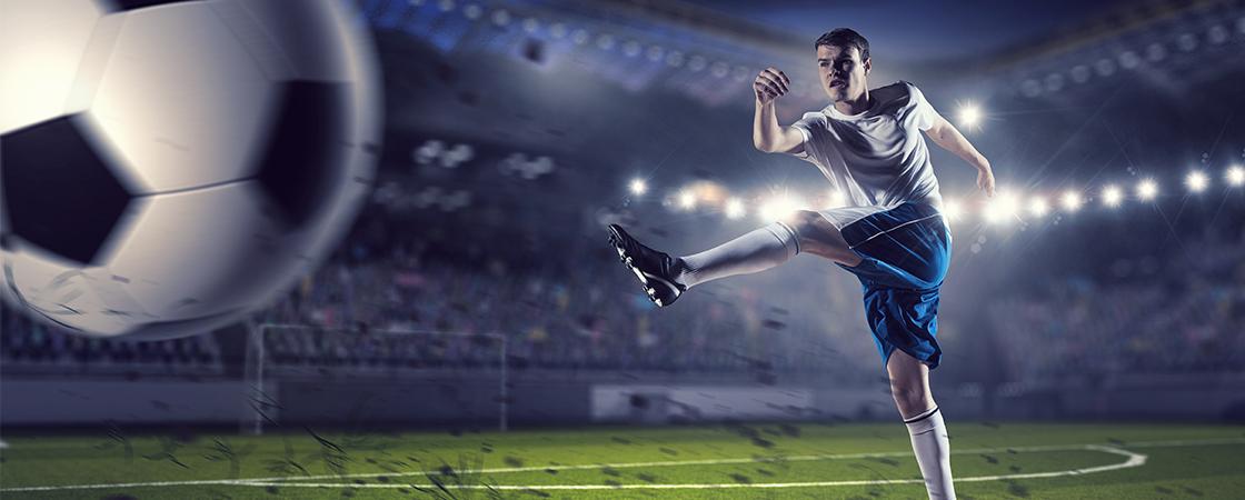 Football player mid-kick